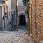 Ancient medieval cobblestone street in Erice, Sicily, Italy