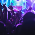 Crowd applauding on a concert