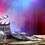 Film movie Background – Clapperboard And Film Reels In Theatre